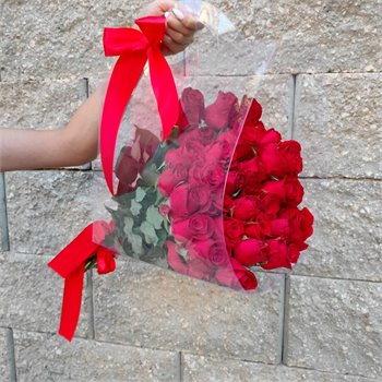 ורדים  בתיק שקוף